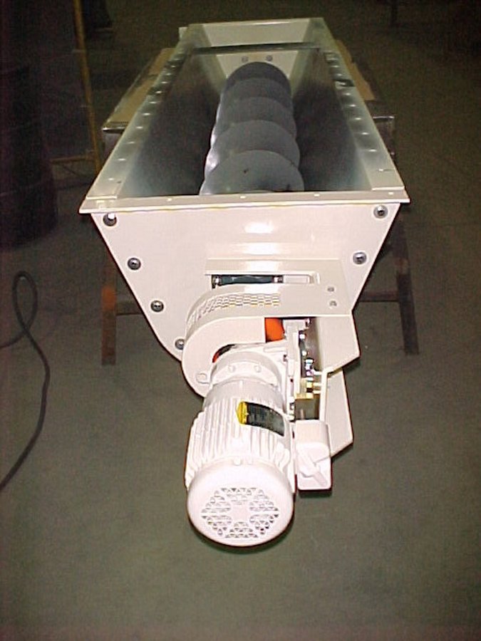 design-build001 A custom-fabricated industrial screw conveyor or auger system with a white powder-coated exterior and a high-torque electric motor.